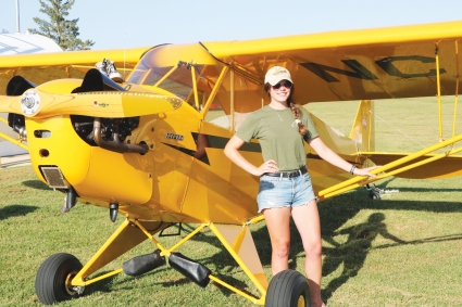 Pilots from all around the USA, as well as some visitors from the United Kingdom attended the annual Red Oak Airport fly-in picnic on Sept 1. One of the pilots was Hannah Shickles, pictured left, with her yellow Piper J-3 Cub.