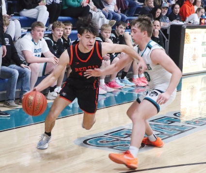 Carson Roeder, shown here earlier this season, scored nine points and grabbed eight steals for Red Oak in its 68-52 loss to Treynor in the district semifinals Friday. (Submitted photo)