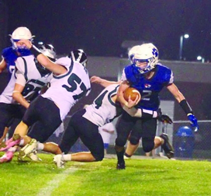 Griswold’s Wyatt Silk runs away from the East Mills defense. Silk finished with 61 yards rushing in the Tigers’ loss. (Submitted by Reagan Thornburg)