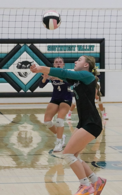 Southwest Valley’s Morgan Shuler, shown here digging up a ball earlier this season, had 34 set assists in the Timberwolves win over Lamoni in the Region 6 quarterfinals. (Joel Stevens/ The Red Oak Express)