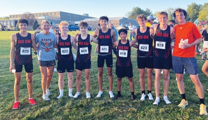 The Red Oak boys cross country team and coaches after winning their first Hawkeye 10 Conference meet since 1982. (Joel Stevens/ The Red Oak Express)