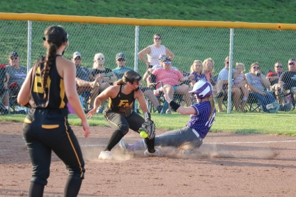 Stanton’s Lilly Ford slides in safely to third base in the Viqueens’ postseason win over Fremont-Mills. (Joel Stevens/ The Red Oak Express)