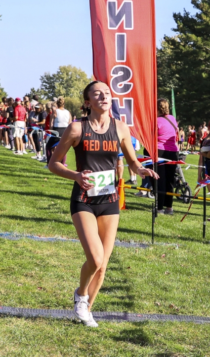 Red Oak’s Mallory Jenkins crosses the finish line ninth at the Western Iowa Conference Cross Country Meet. (Joel Stevens/ The Red Oak Express)